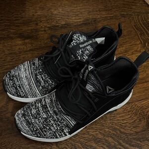 Reebok Women's Black and White Knit Slip-On Sneakers